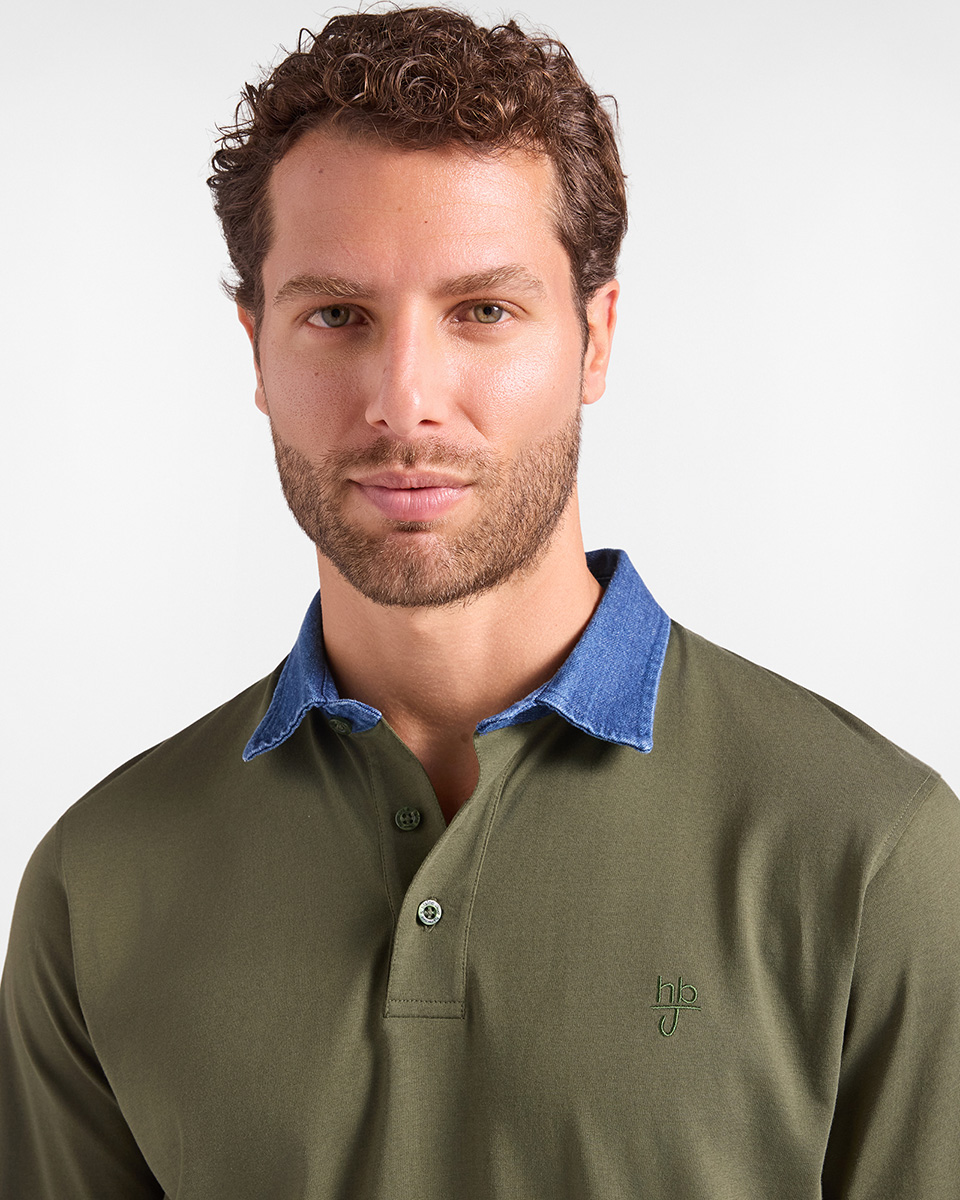 For the HB Jeans polo category, a model wears an olive green long-sleeved polo shirt featuring a contrasting blue denim collar and a small tone-on-tone logo embroidered on the chest against a light background.