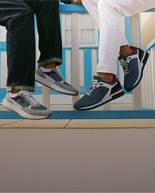 Cropped shot of two guys wearing colorful Harmont & Blaine sneakers