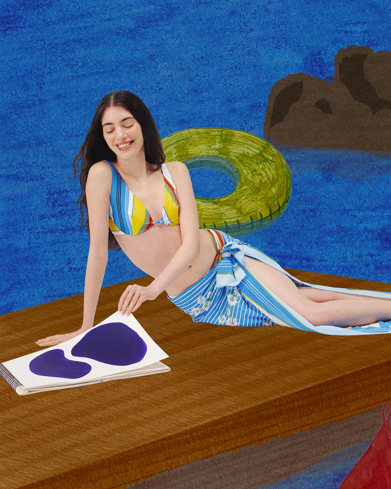Smiling woman lounging in a colorful striped bikini with a matching sarong, in front of a playful blue background with an illustrated pool float.