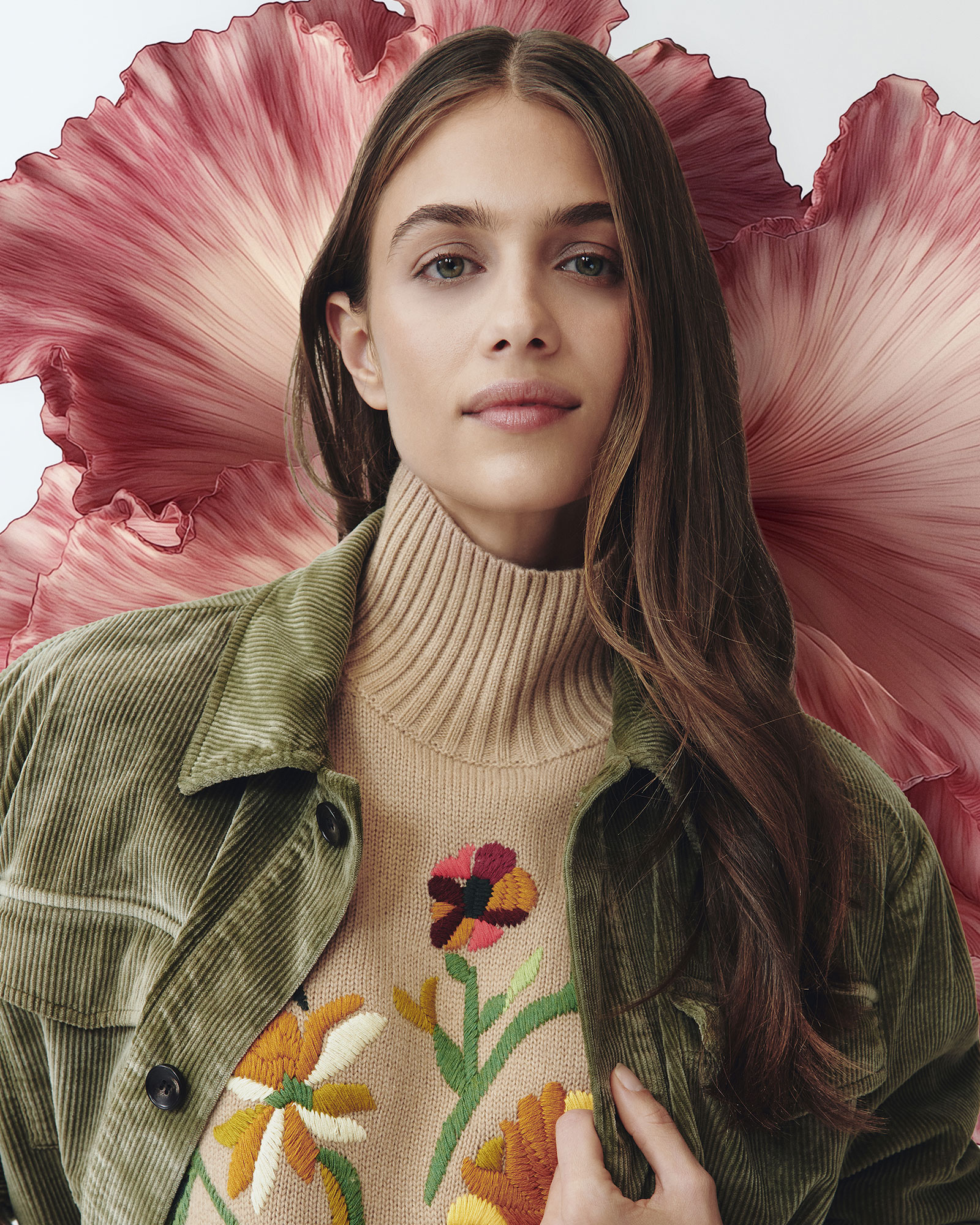 Model wearing beige floral embroidered sweater and green corduroy jacket.