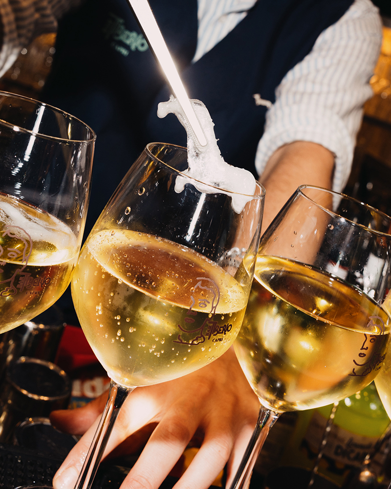 Sparkling wine glasses at Bar Tiberio during the event.