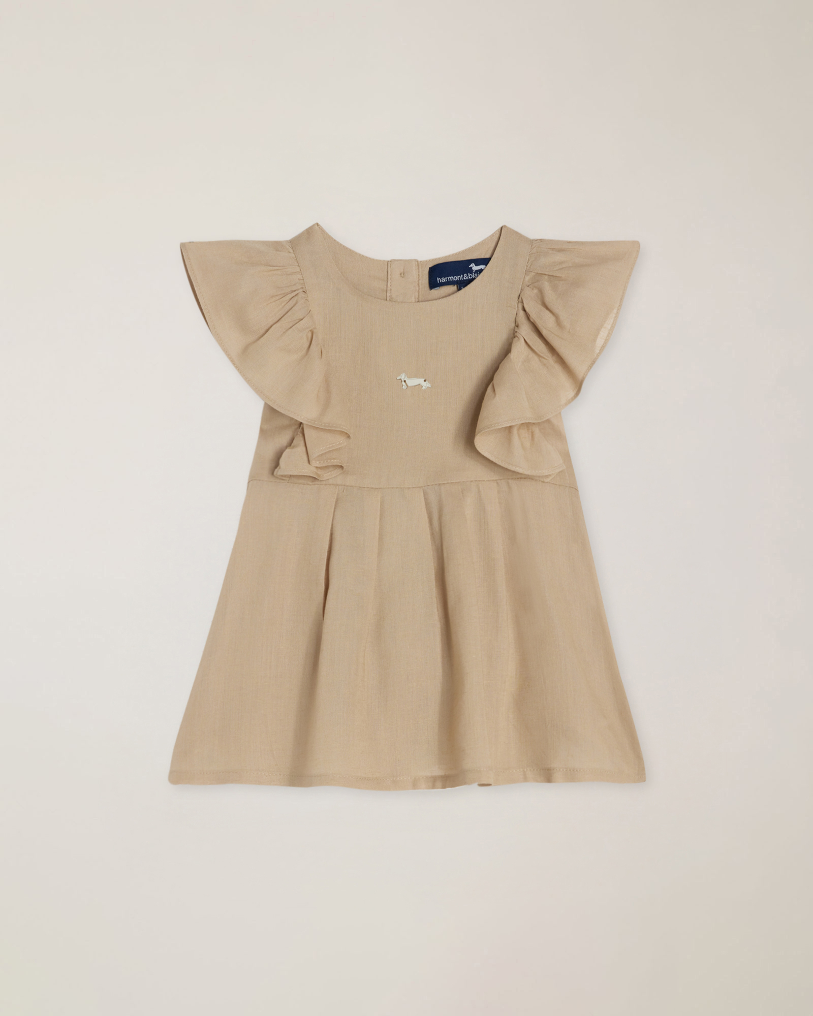 Linen blend blouse with ruffles and dachshund plaque