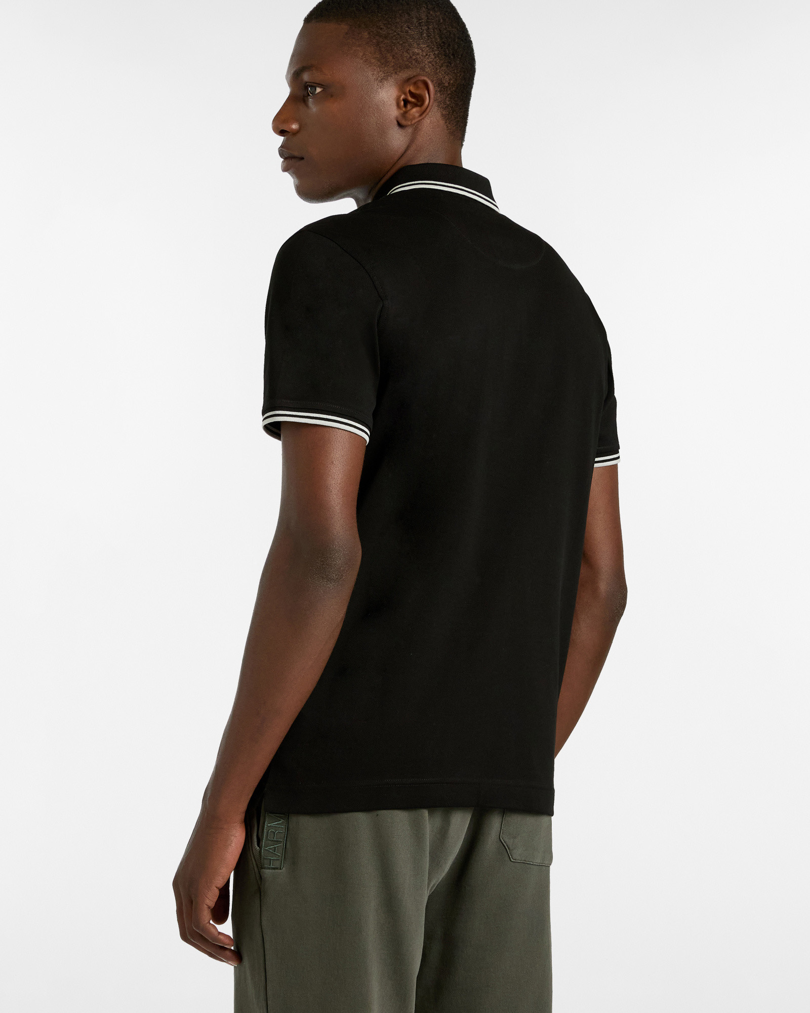 Essentials polo shirt in plain coloured cotton, Black, large image number 1