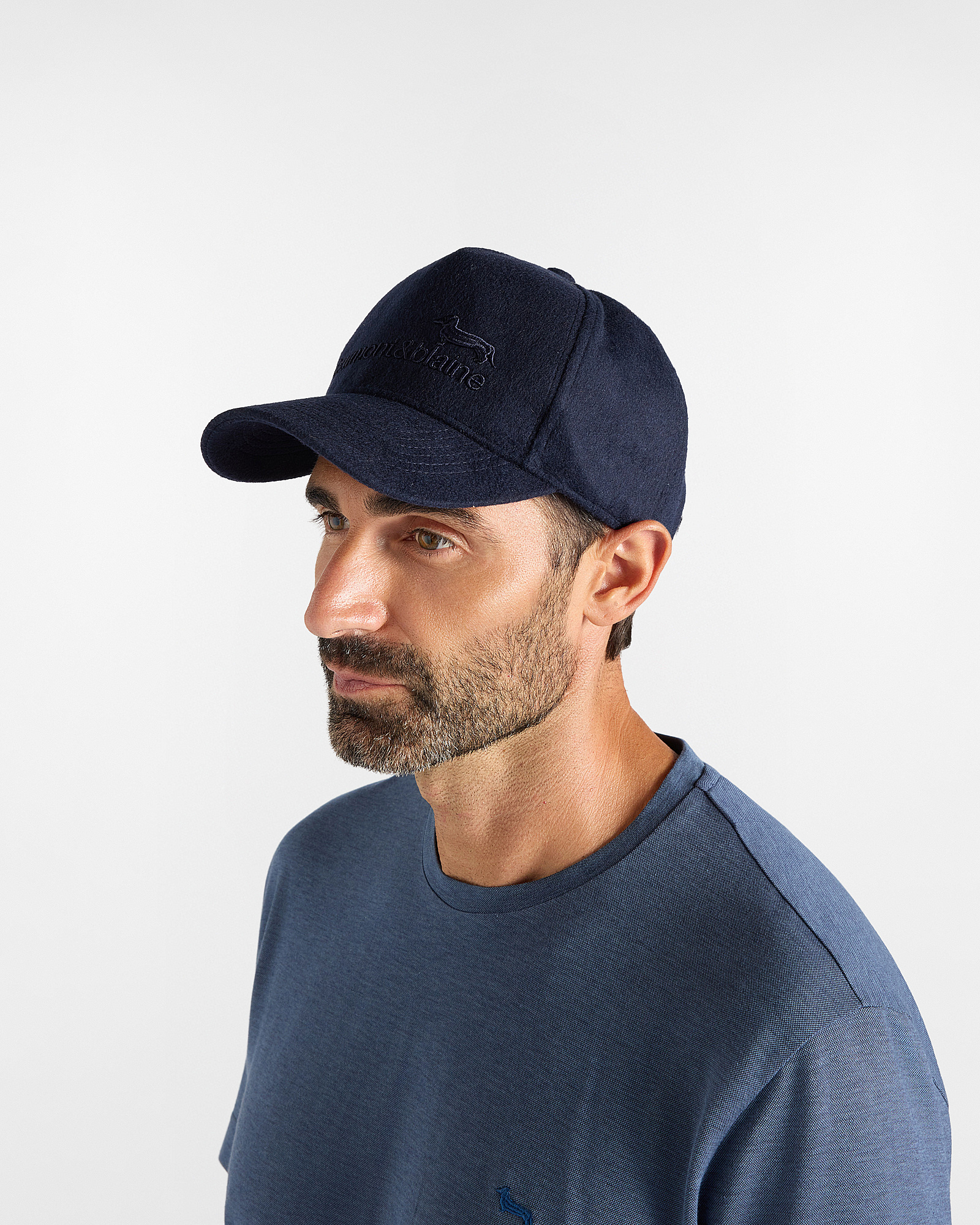 Men&rsquo;s navy blue baseball cap in a wool blend with an embroidered dachshund