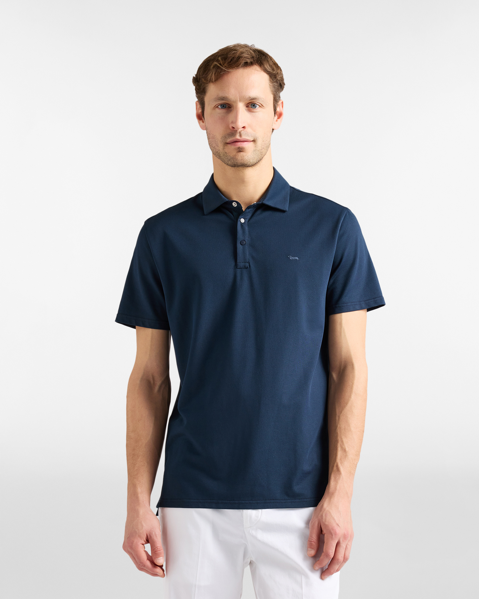 Men's polo shirt with snap buttons in technical piqu&eacute;