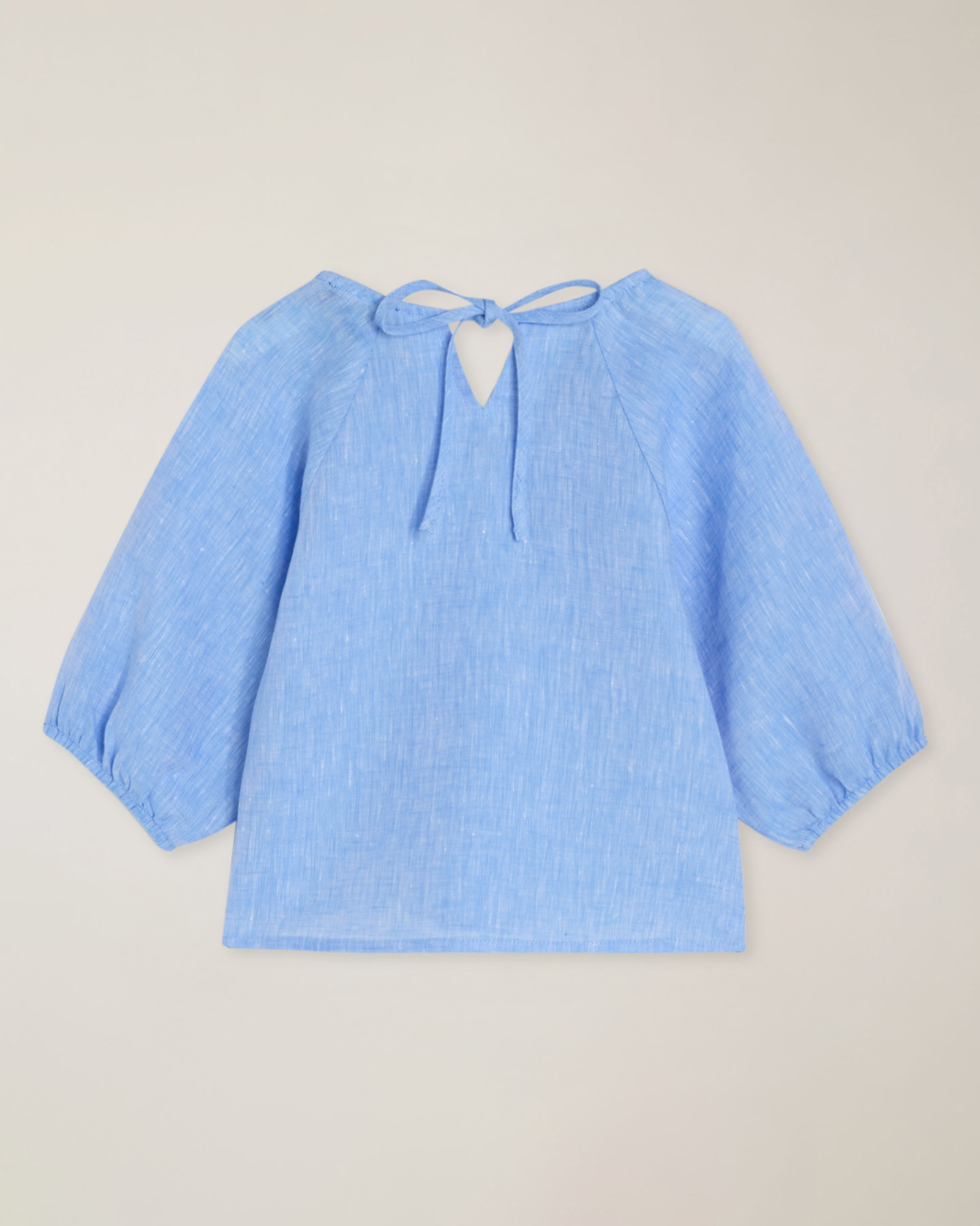 Linen blouse with embroidered logo