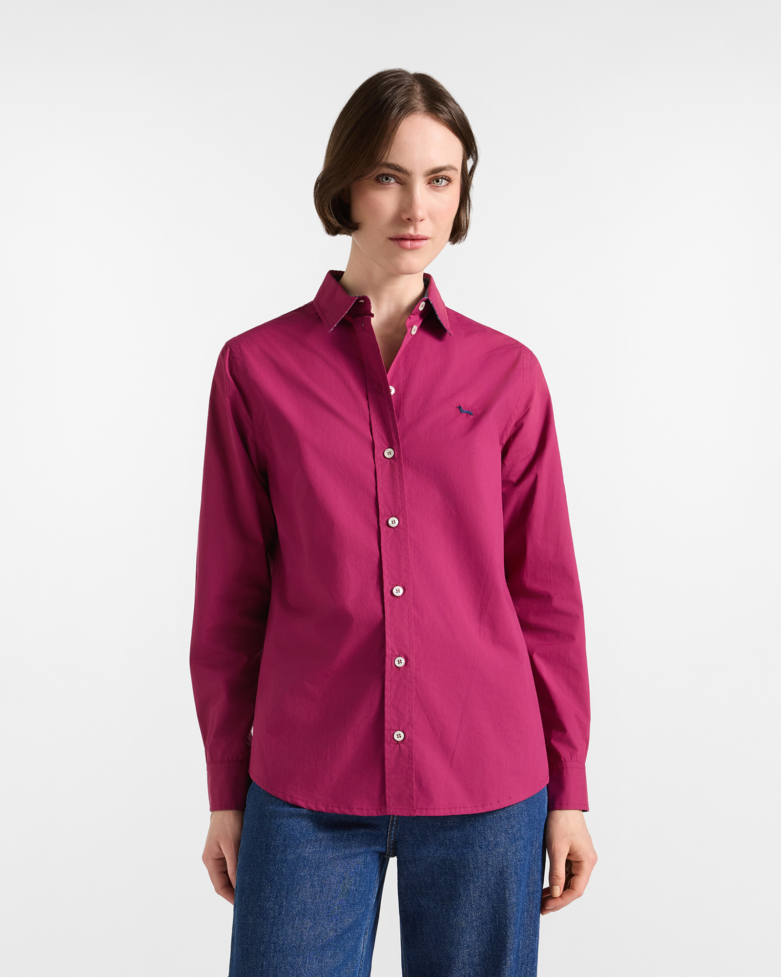 Women's solid fuchsia shirt with tie fabric details