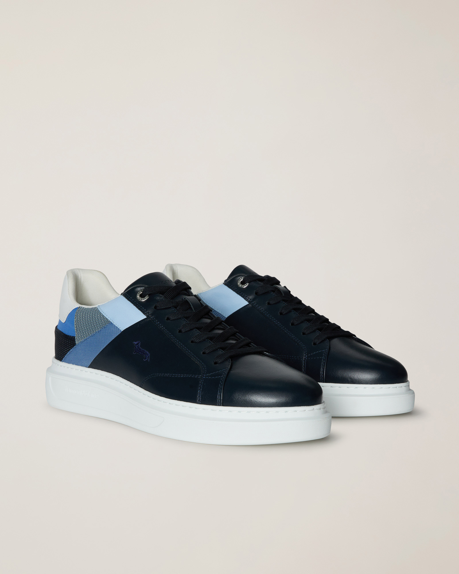 Sneaker with Patchwork Inserts