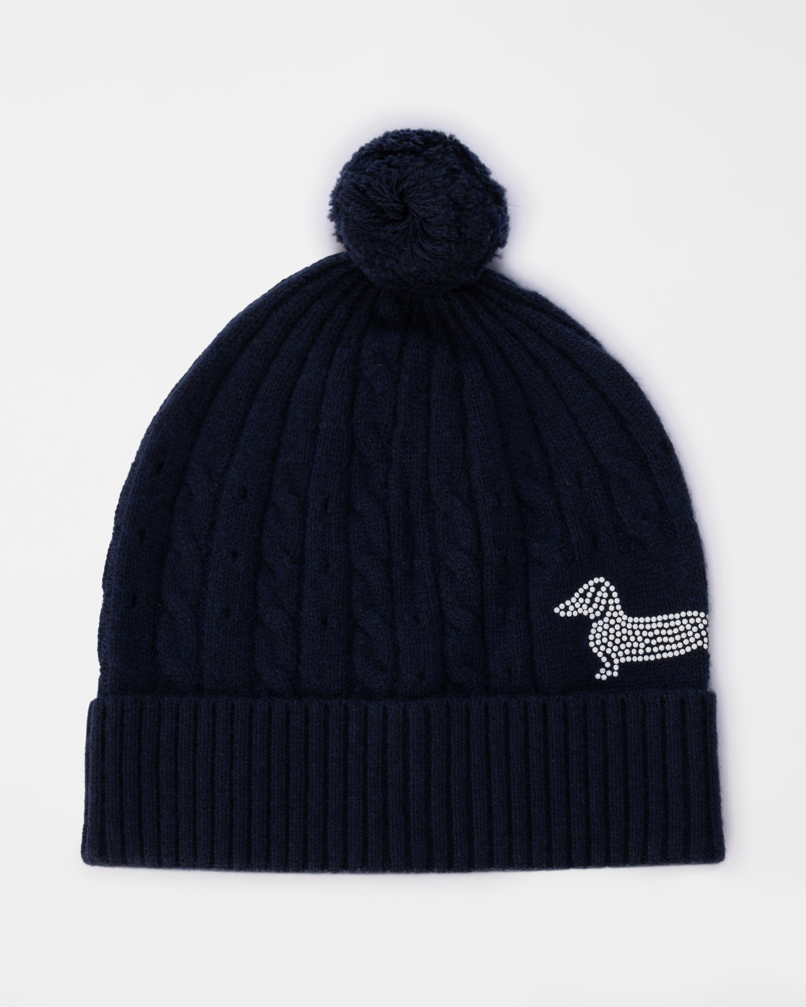 Women's beanie in dark blue wool blend with pom pom and braided knit