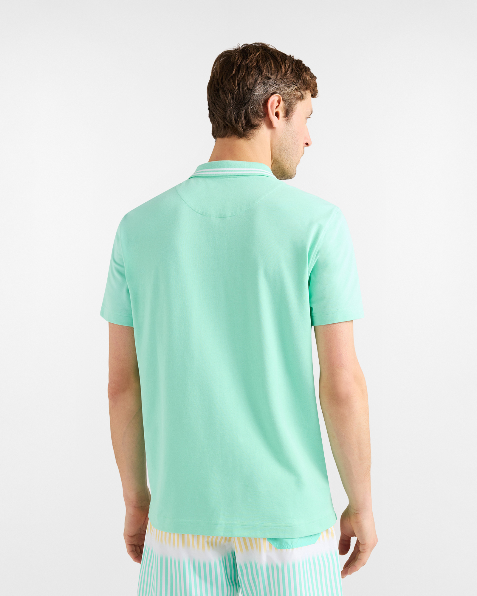Men's polo shirt with zip in stretch piqu&eacute;