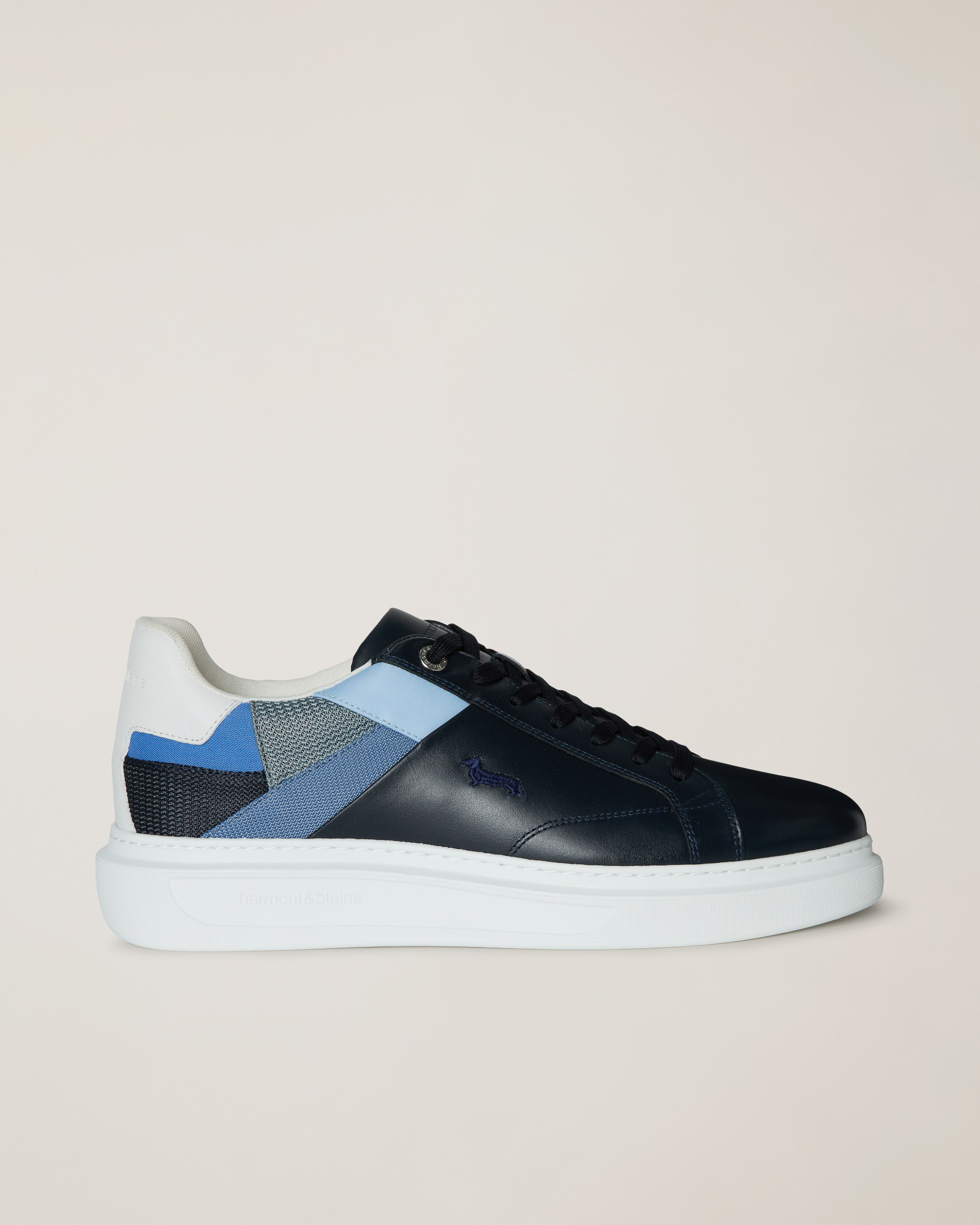 Sneaker with Patchwork Inserts