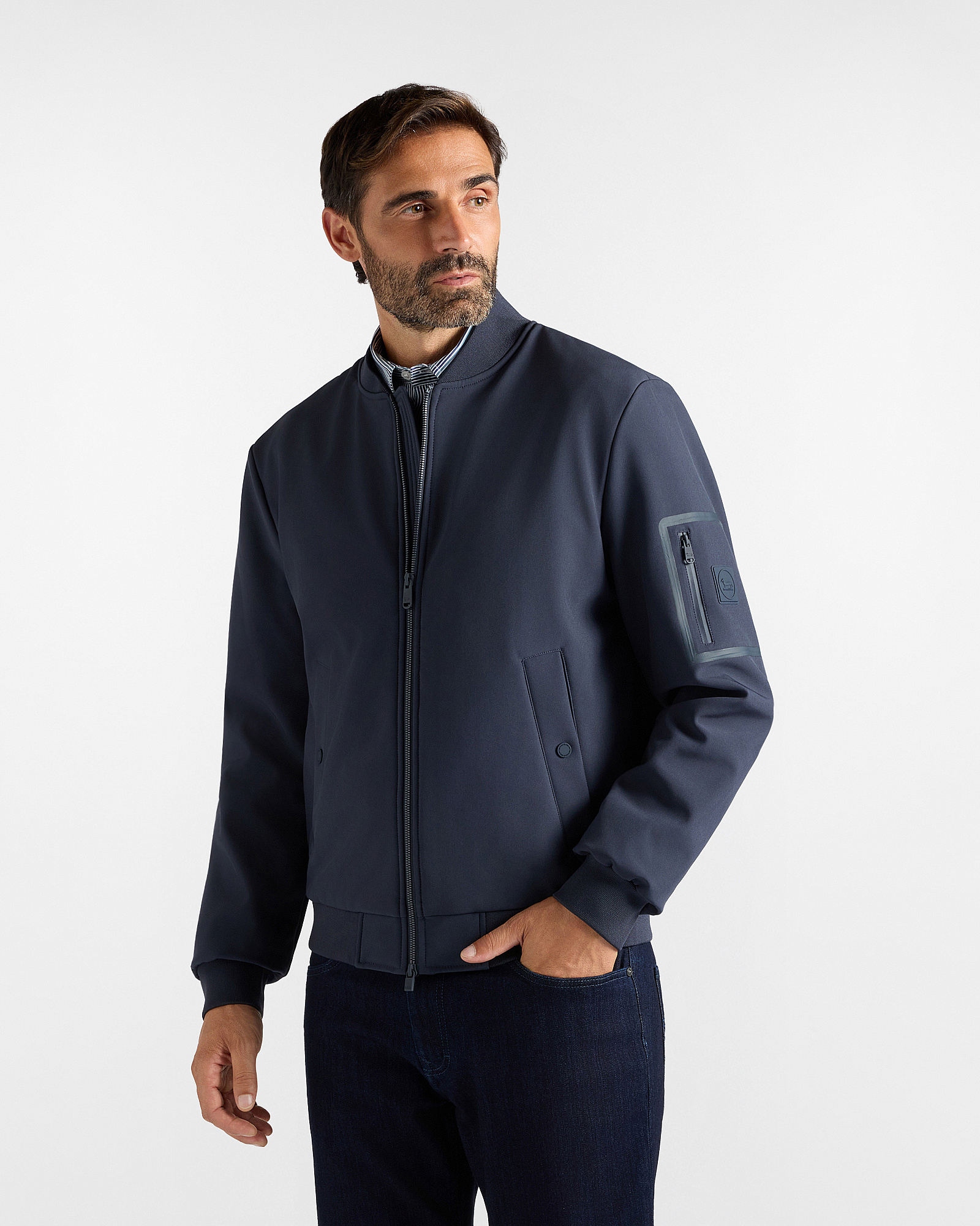 Men's blue softshell jacket with rib-knit trims