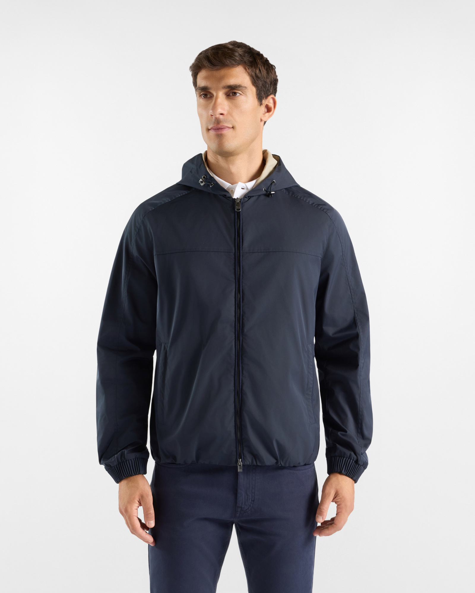Men's blue nylon jacket with packable hood