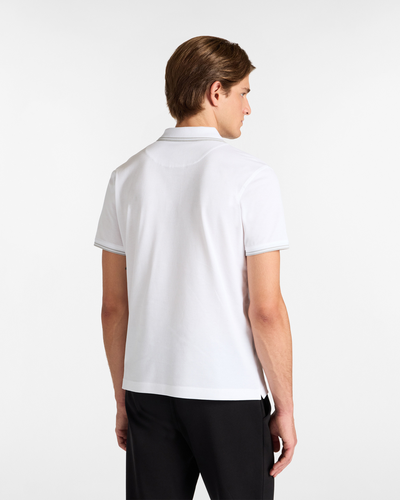 Polo Essentials de algodón liso