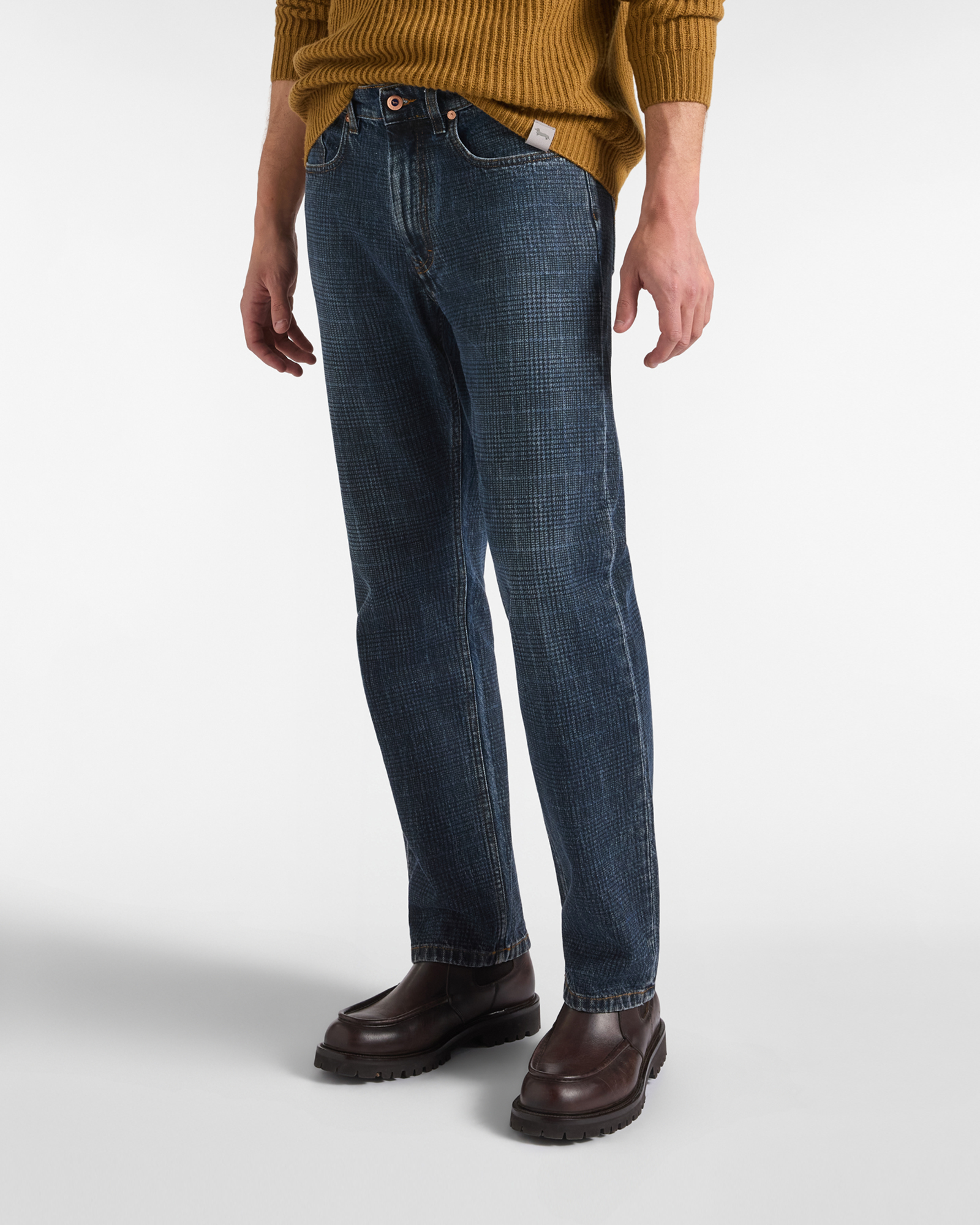 Men&rsquo;s blue denim jeans with laser-cut patches