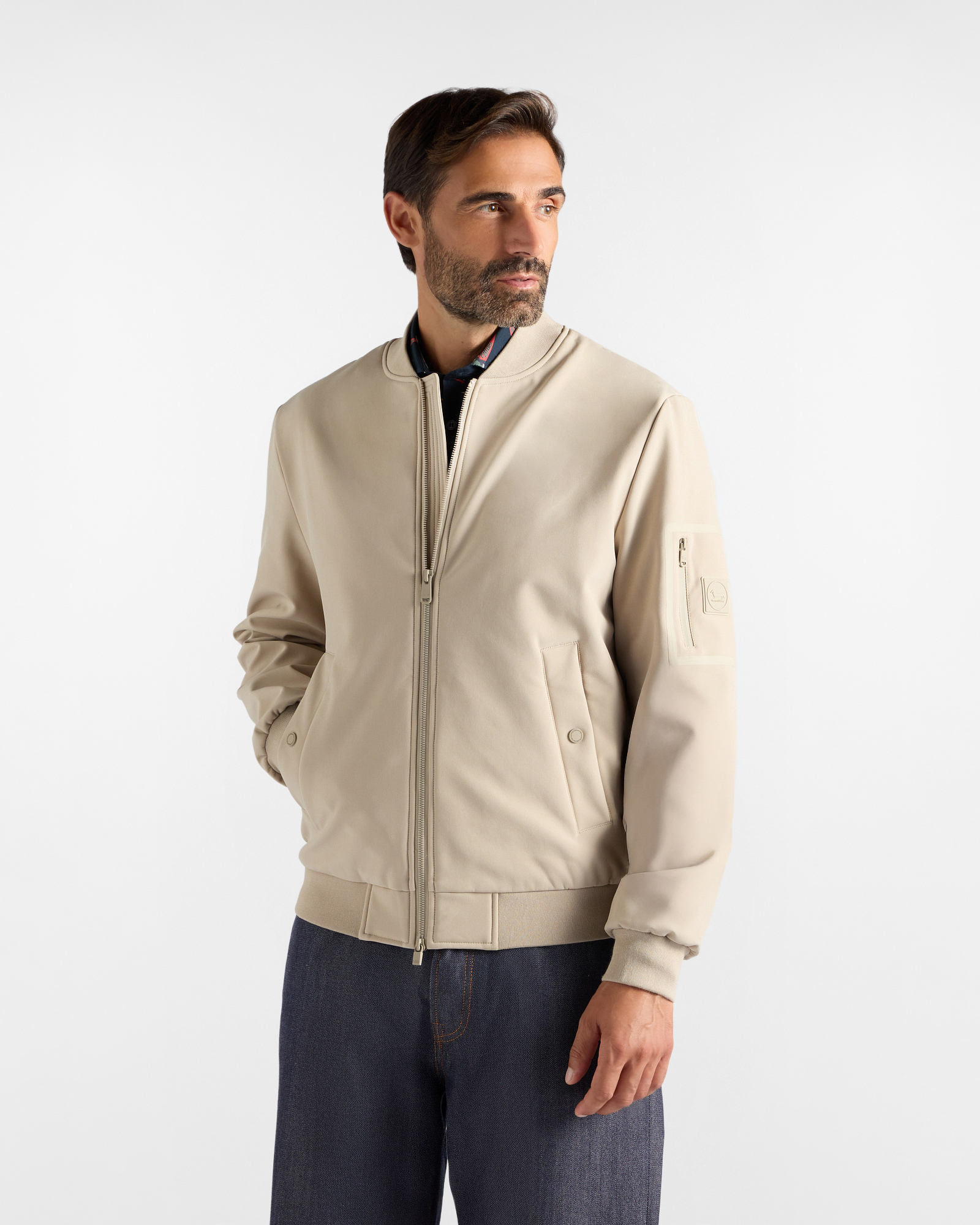 Men's beige softshell jacket with utility pocket